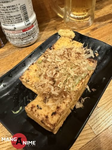 Okonomiyaki preparado en un restaurante de Nakazawa