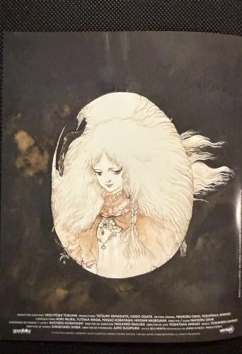 Reverso del libreto de Angel’s Egg con el texto de presentación y una ilustración de la película.
